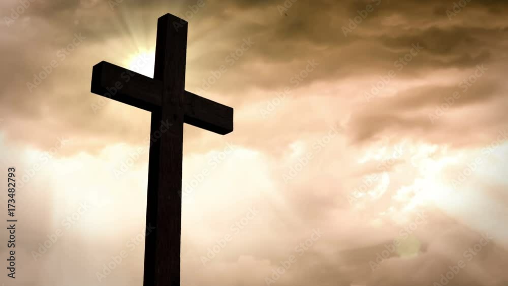 Cross in front of a beautiful sky Cross in front of a beautiful sky