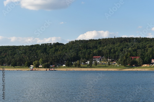 Summer Panorama with Blue Sky and Fluffy White Clouds