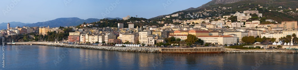 Corsica, 03/09/2017: lo skyline di Bastia, la città alla base del Capo Corso, vista dal porto principale dell'isola da cui partono e arrivano traghetti e crociere