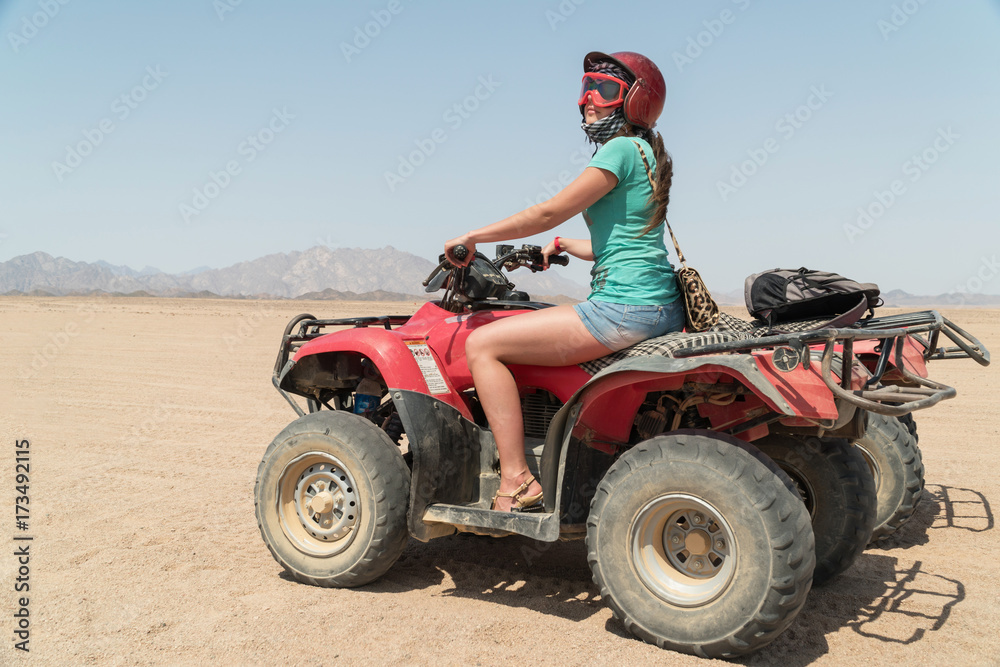 Adventurous woman on road trip through the Desert in Egypt Adventurous woman on road trip through the Desert in Egypt