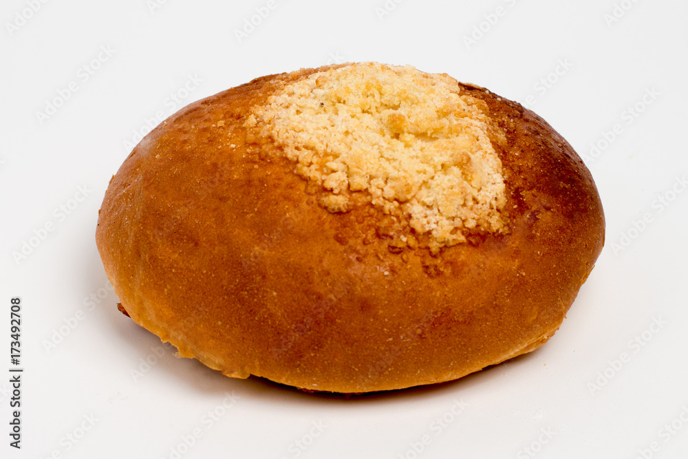 Sweet cinnamon bun roll swirl isolated over the white background Sweet cinnamon bun roll swirl isolated over the white background