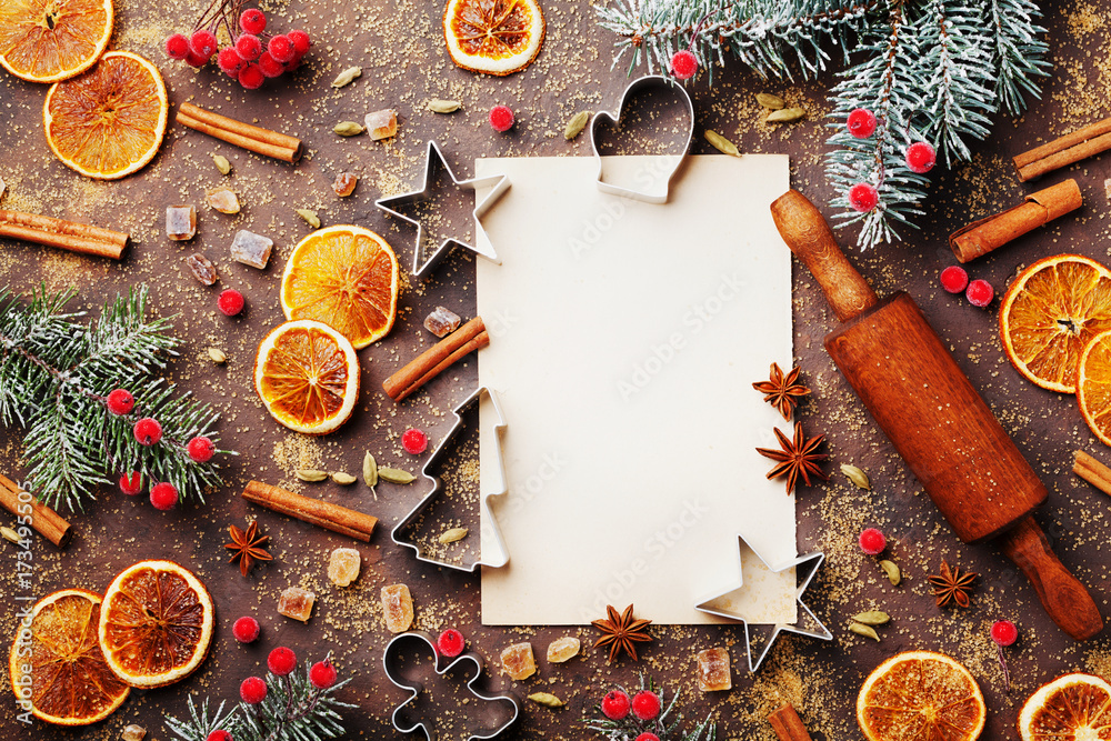 Christmas food background frame.Culinary background for a Christmas baking  recipe, cookie molds, ingredients, spices, top view, flat lay, copy space  Stock Photo