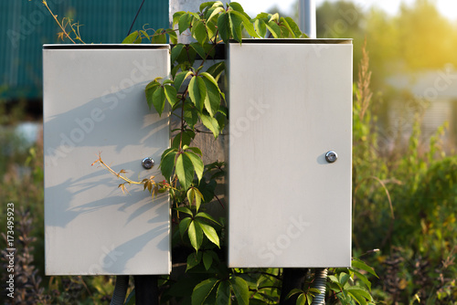 Electric control box on iron pole photo