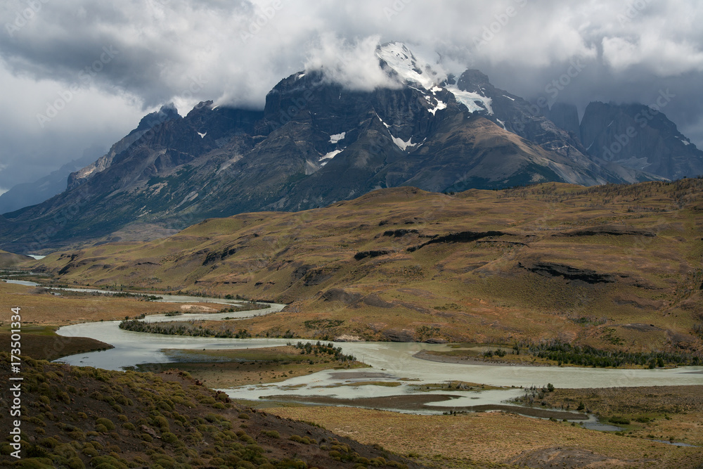 River valley at the foot of the mountain. National Park Torres del Paine. Patagonia. Chile.