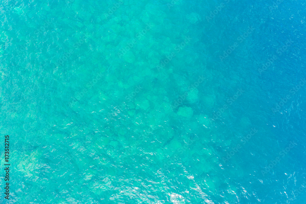 the surface of the water, turquoise in color with bird's eye
