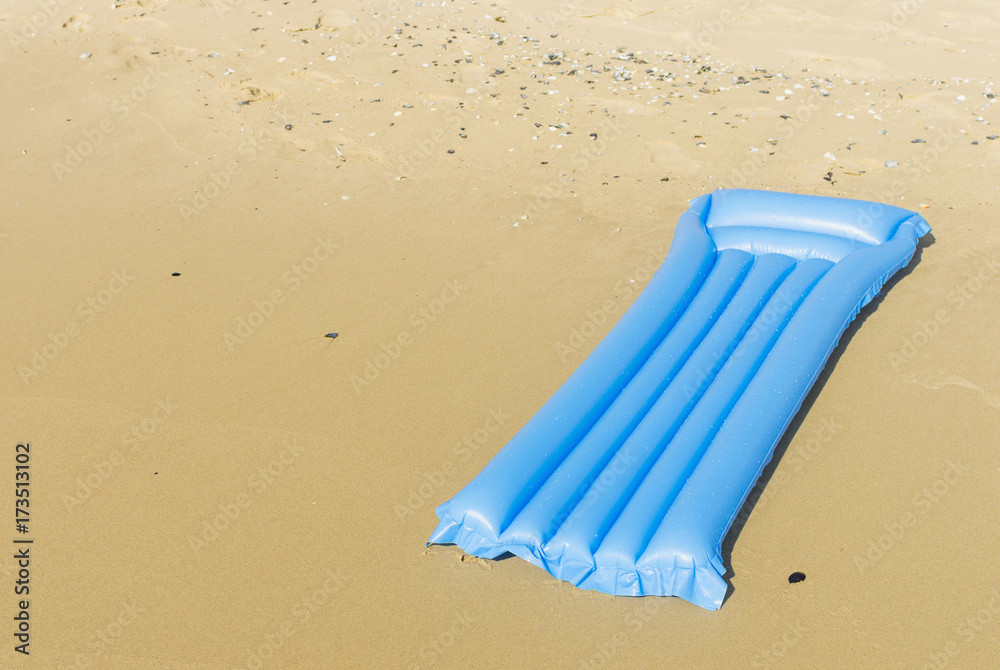 Air mattress on the beach. Inflatable mattress for travel background. Selective focus. Air mattress on the beach. Inflatable mattress for travel background. Selective focus.