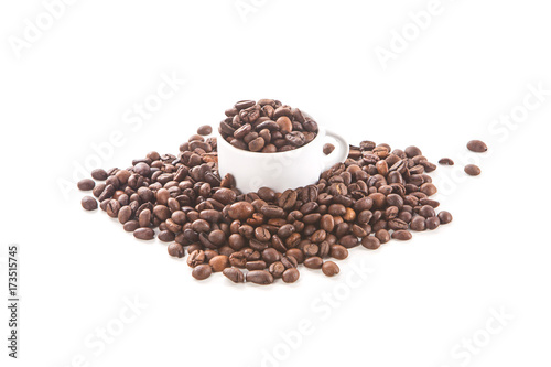 White cup and coffee beans
