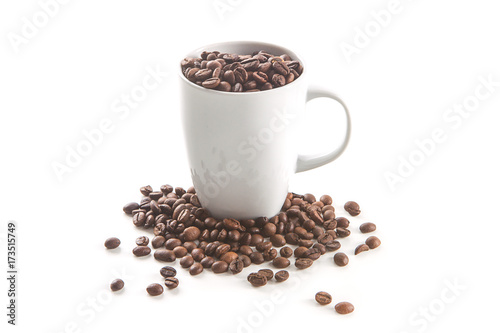 White cup and coffee beans