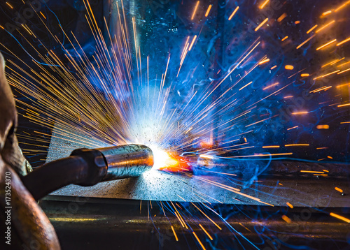 Industrial steel welder in factory technical,