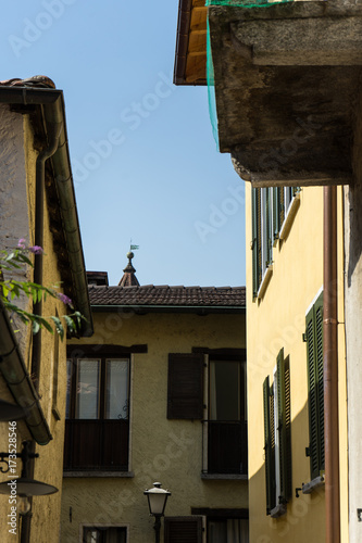 vintage yellow paintet house street scene mediterranean architecture design photo