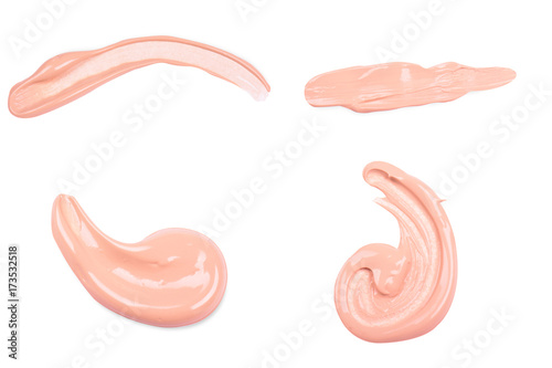 Liquid makeup foundations smear drop set on white background.