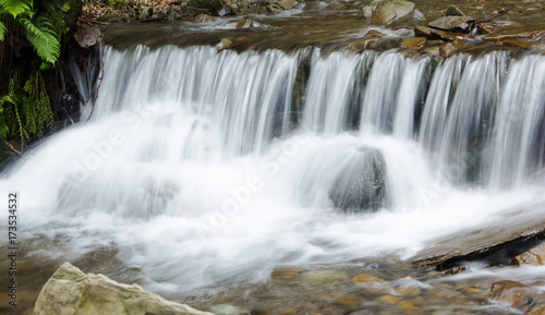 Fototapeta Naklejka Na Ścianę i Meble -  Mountain waterfall landscape. Close-up