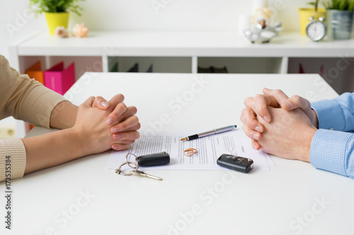 Woman and man going through marriage contract