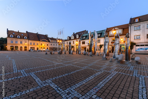 Central square in Zory after sunset.