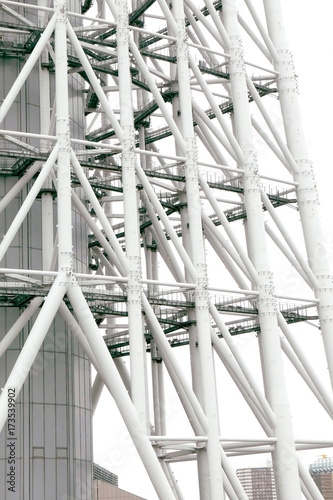 Vertical Japan white tower building closeup