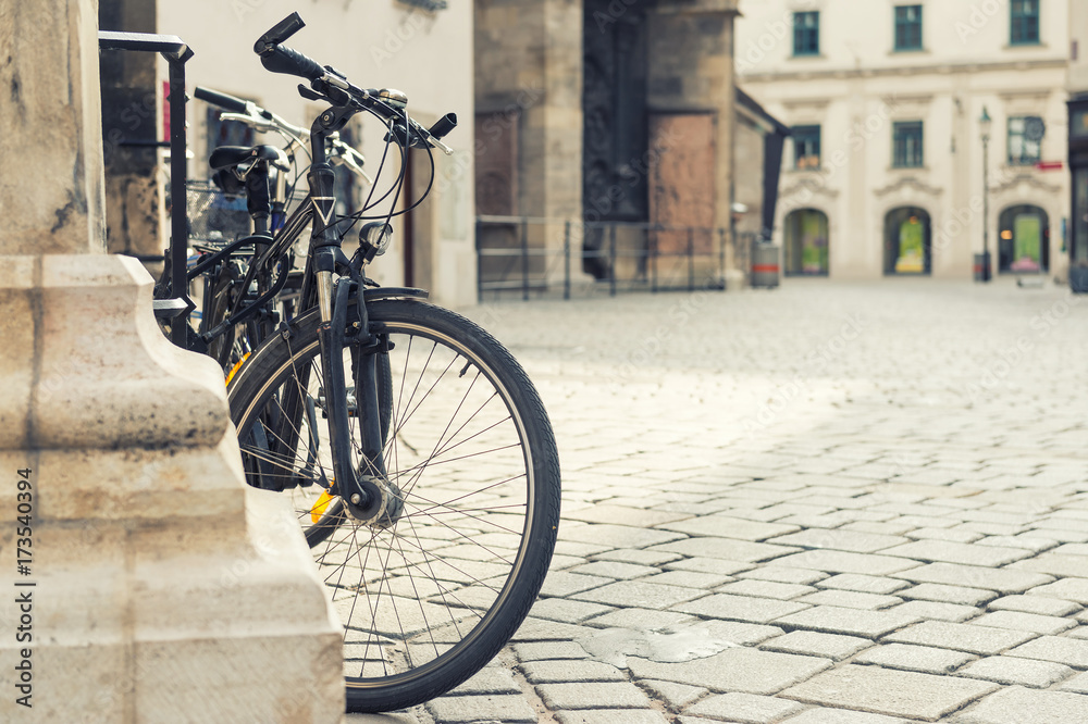 close up photo of bicycle in old european town. Vienna, Austria close up photo of bicycle in old european town. Vienna, Austria