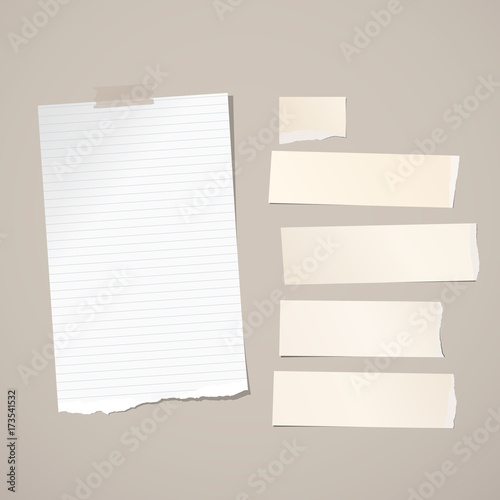 Note, notebook, copybook paper stuck on brown background.