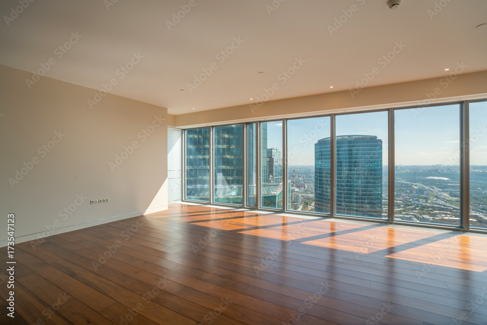 Empty interior apartment with panoramic city view. Empty interior apartment with panoramic city view.