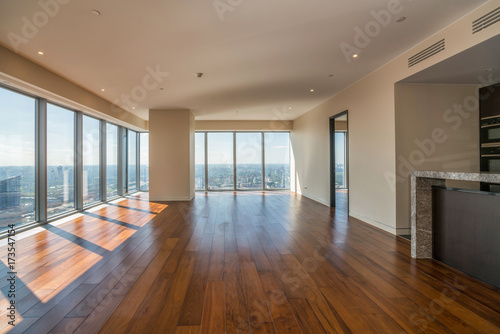 Empty  interior apartment with panoramic city view.