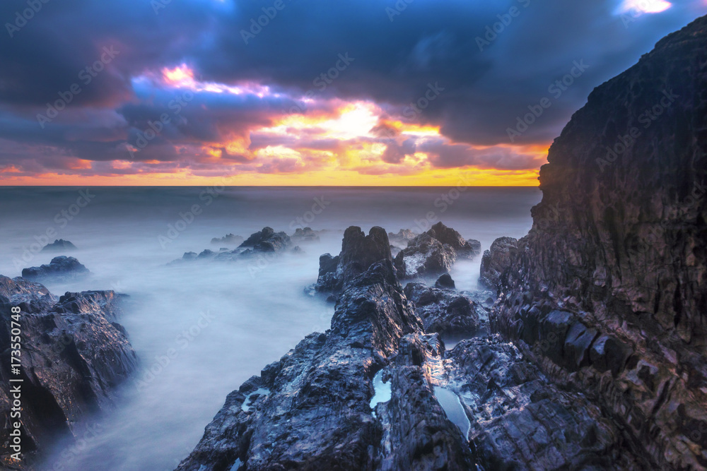 Bude, Cornwall, United Kingdom at sunset, beautiful seascape, sea crashing against rocks