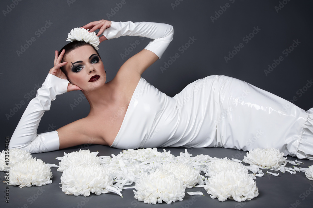 Beautiful fetish glamorous woman in white vinyl dress Stock Photo | Stock
