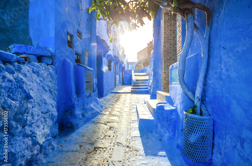 Sunset with star beams at famous blue city of Chefchaouen, Morocco. photo