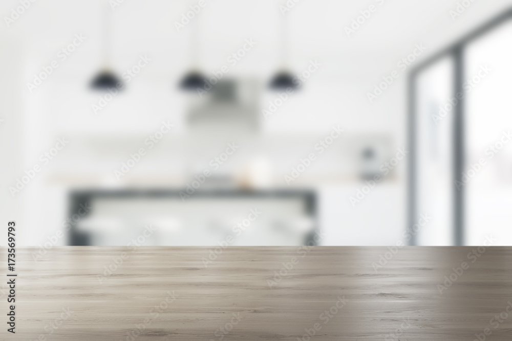 White kitchen with a countertop, blurred