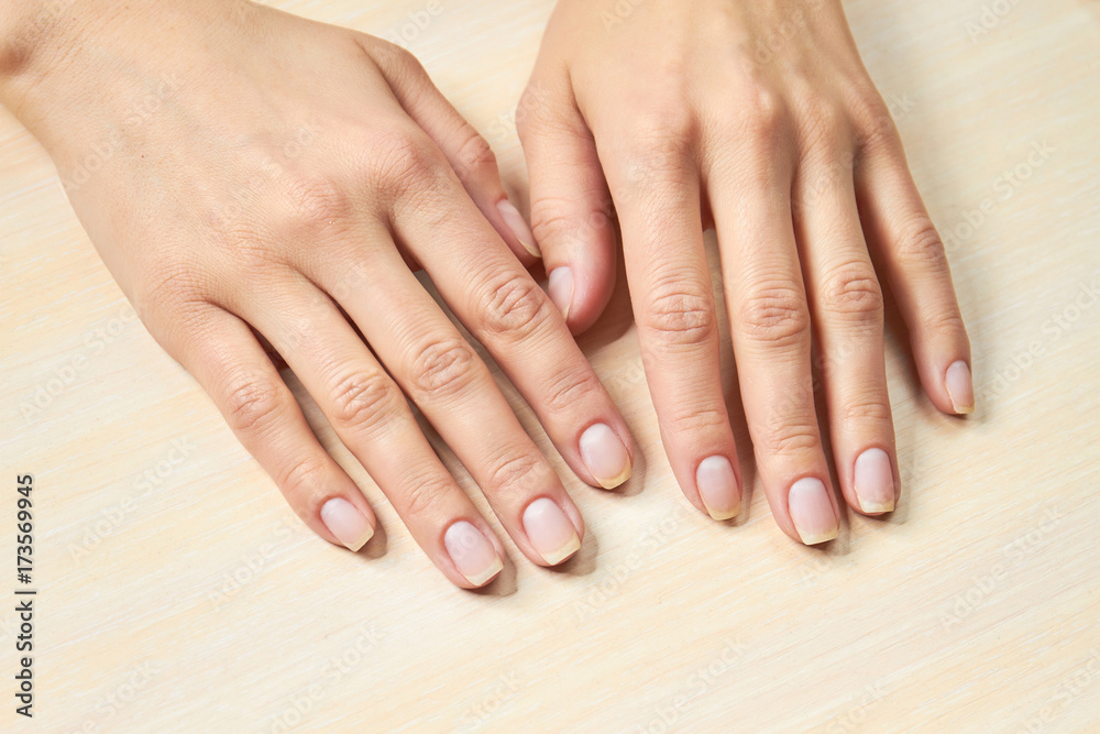 Female gentle hands. Woman beautiful hands on salon table. Woman hands in nails and spa salon. Female gentle hands. Woman beautiful hands on salon table. Woman hands in nails and spa salon.