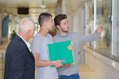 Students looking at notice boards