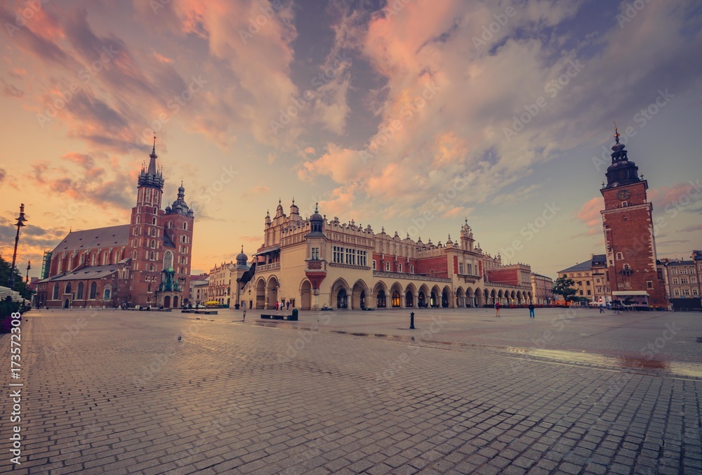 St Mary's church, cloth hall and town hall on Main Market Square in Krakow, colorful morning