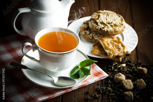 Tea in a cup on an old background