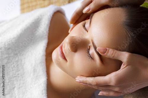 Portrait of Young Beautiful Woman in Spa Salon.Spa Body Massage Treatment and Skincare.Leisure.