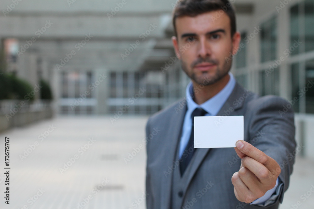 Professional showing his business card Professional showing his business card