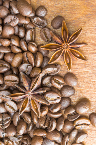 Roasted coffee beans , star anise. Roasted coffee bean background close up. The vertical arrangement.