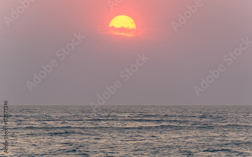 Fototapeta Naklejka Na Ścianę i Meble -  Hazy Sunrise Seascape