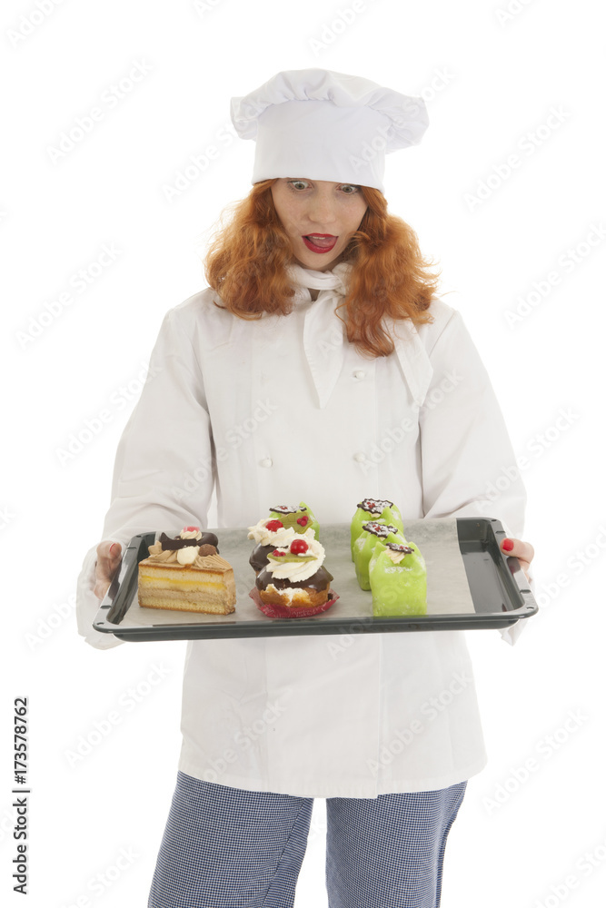 Female baker chef with Christmas pastries Female baker chef with Christmas pastries