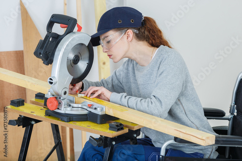 disabled woman carpenter © auremar