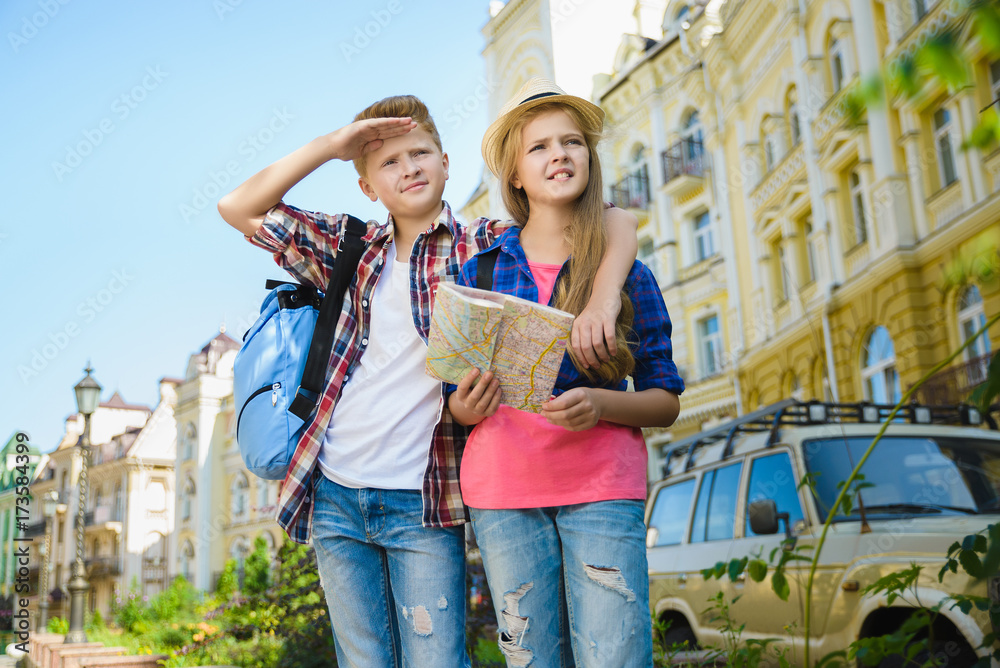 Naklejka premium group of children travel in Europe. Tourism and Vacation concept