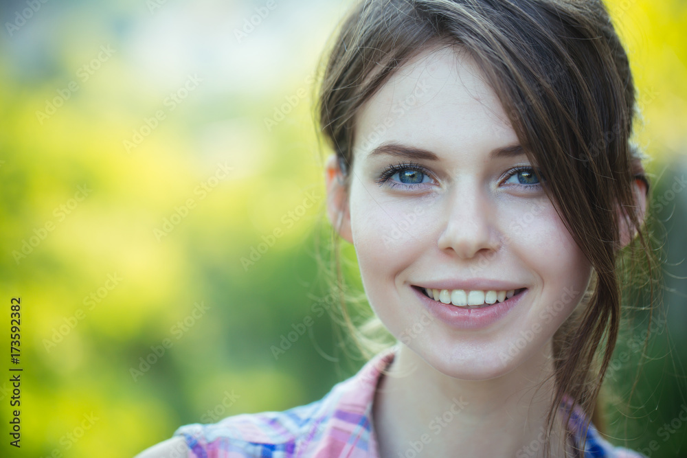 Happy girl with brunette hair, hairstyle, outdoors Happy girl with brunette hair, hairstyle, outdoors