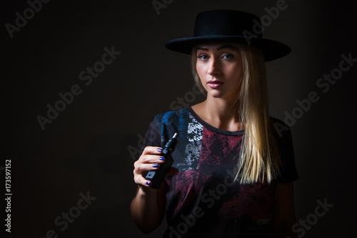 Girl with an electronic cig...