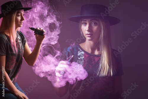 Vape girl. The girl smokes ...