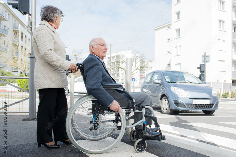 wealthy senior man in wheelchair with wife retirement wealthy senior man in wheelchair with wife retirement