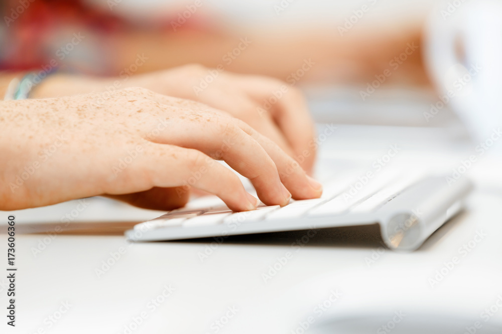 Hands typing on the keyboard Hands typing on the keyboard