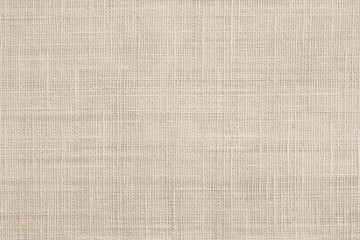 Jute hessian sackcloth canvas woven texture pattern background in light beige cream brown color