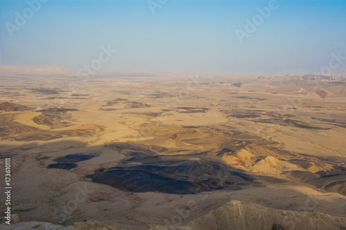 view of the crater from the rock. National park HaMakhtesh Mitzpe Ramon. Unique relief geological erosion land form. Negev,Israel