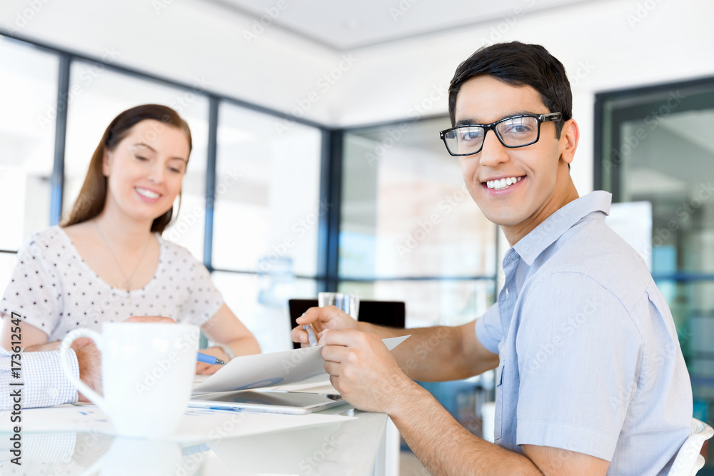 Young man in casual in office