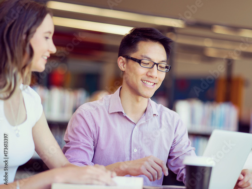 Two young students at the library