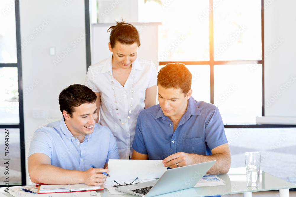 Group of happy young business people in a meeting Group of happy young business people in a meeting