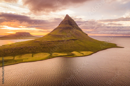 Iceland nature Kirkjufell mountain landscape in West Iceland on the Snaefellsnes peninsula. Icon of Iceland travel and most photographed icelandic mountain. drone aerial view from above.