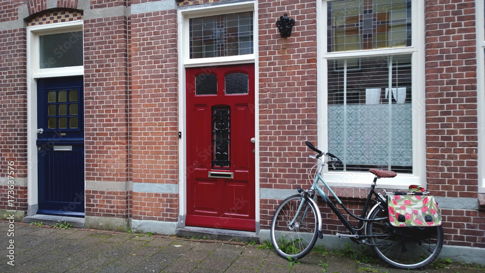 A typical street in Alkmaar - the front door next to the bike